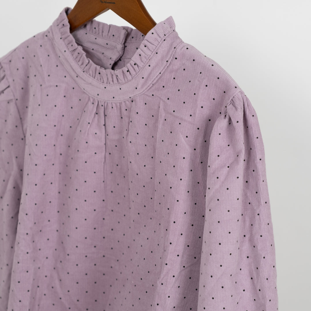 コールテンドットのフリルネック