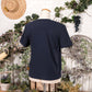 お気に入りの一冊と猫のTシャツ