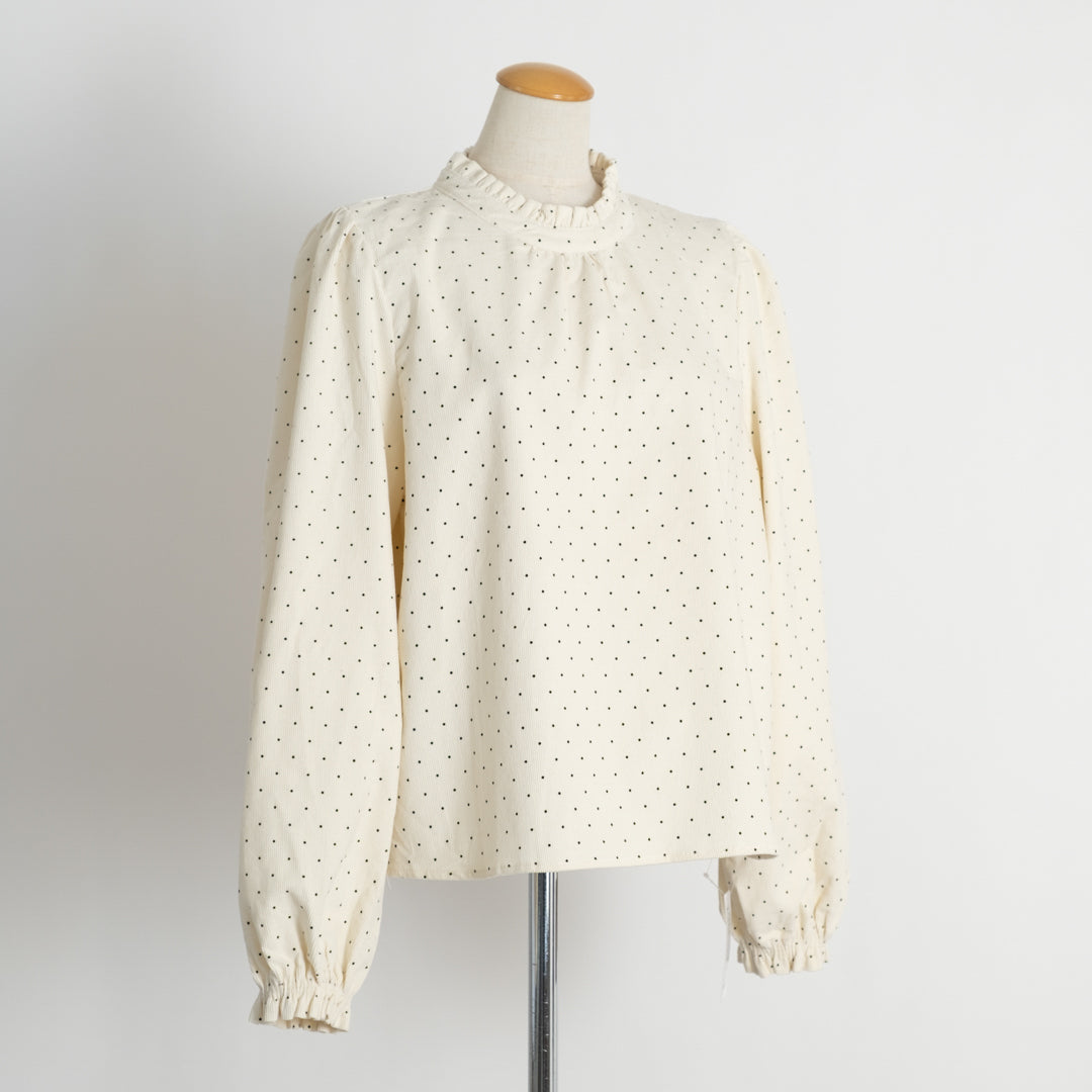 コールテンドットのフリルネック