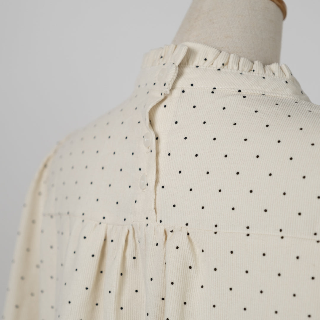 コールテンドットのフリルネック