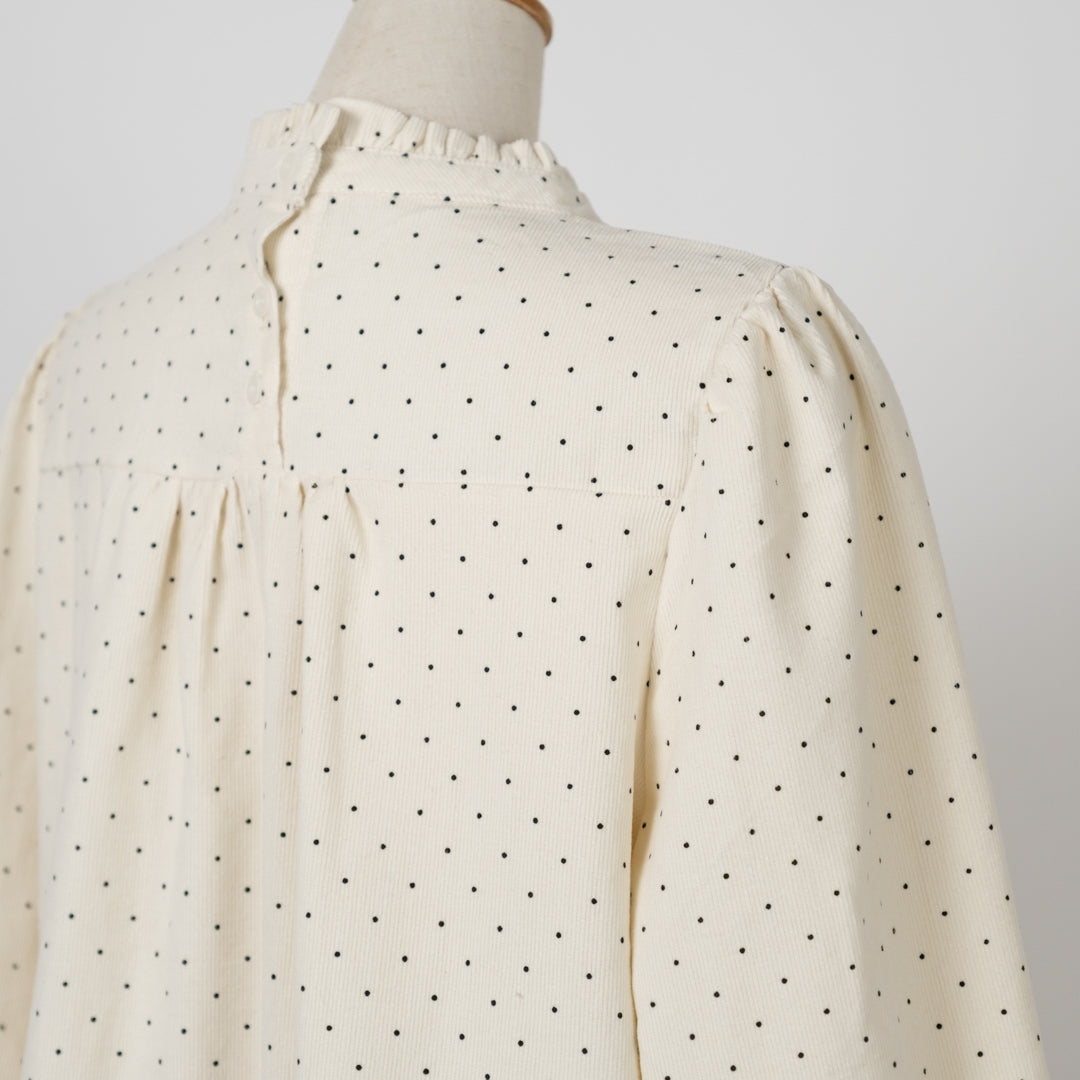 コールテンドットのフリルネック