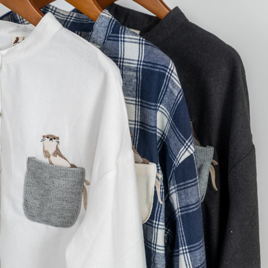 多ボタンニットポケットブラウス