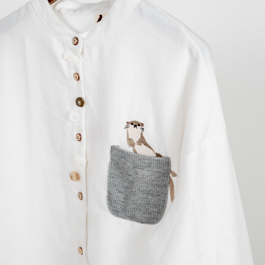 多ボタンニットポケットブラウス