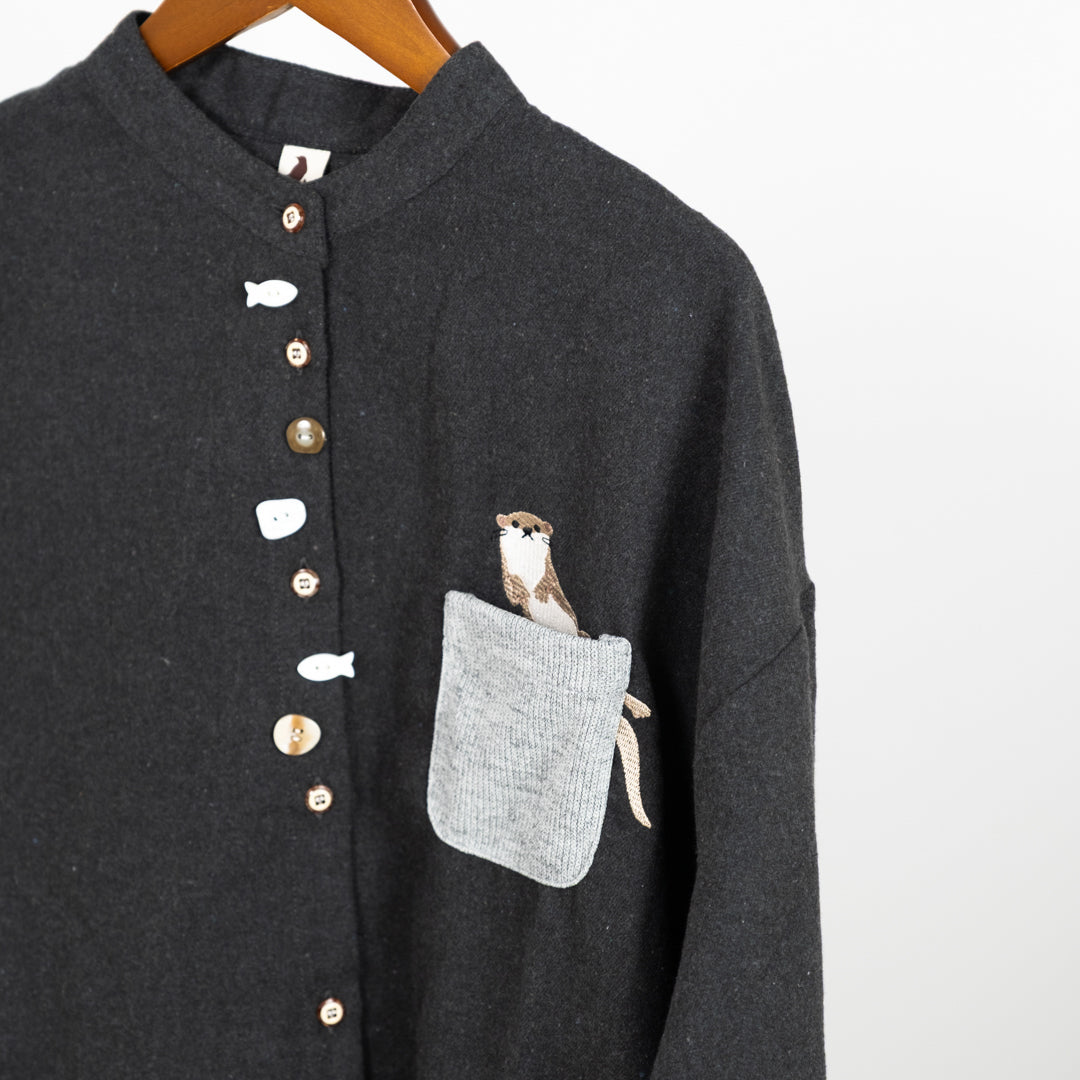 多ボタンニットポケットブラウス